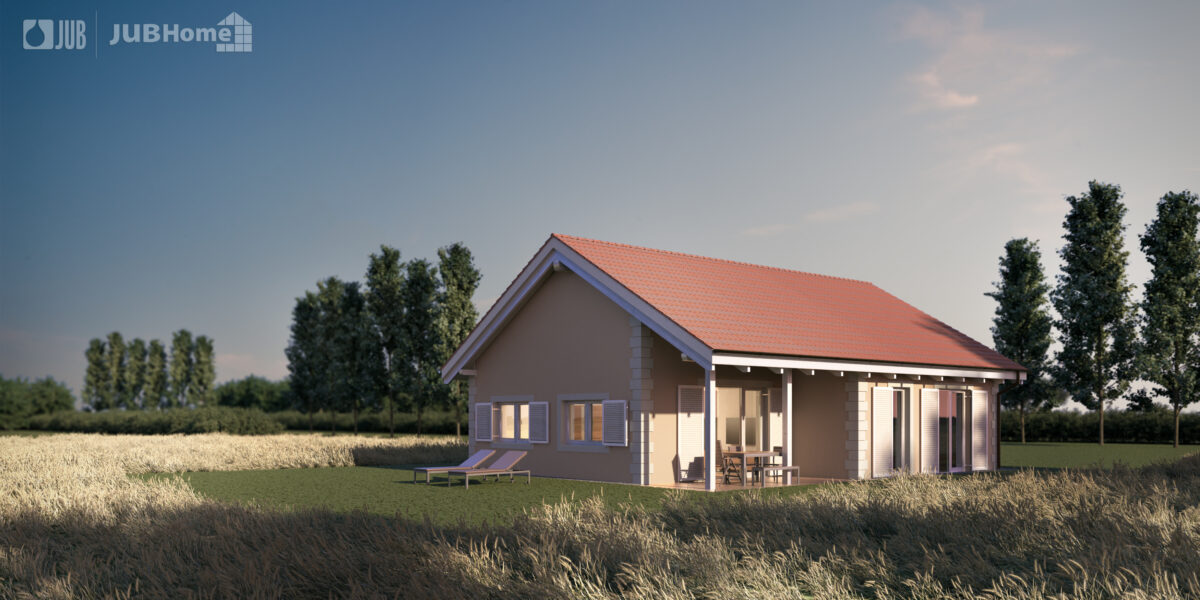 Enodružinska hiša z dvokapno streho, teraso in vrtom, umeščena v naravno okolje, primer trajnostne in udobne gradnje